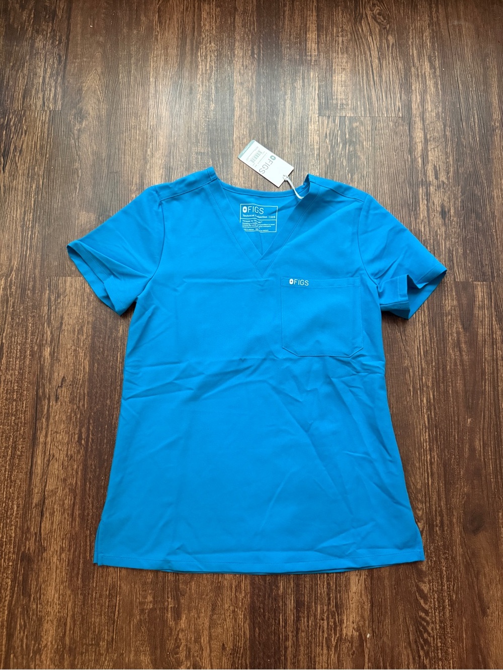 NWT FIGS Women’s Extreme Blue Catarina Extremes One Pocket Scrub Top - Size XXS